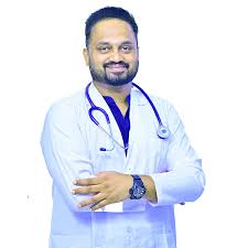 Dr Harsha C M